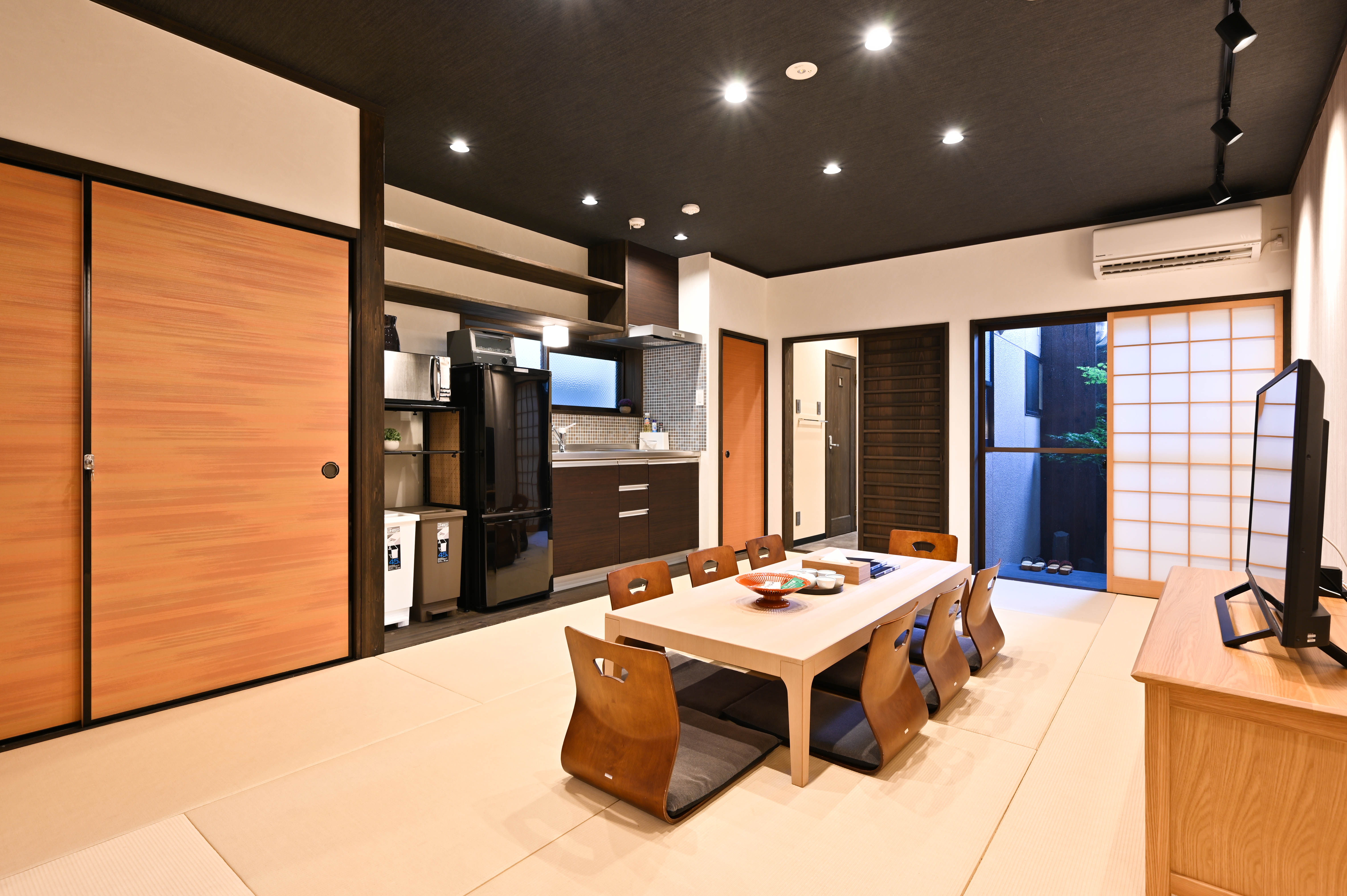 Andon Gojo spacious tatami living and dining area with low table and zaisu chairs