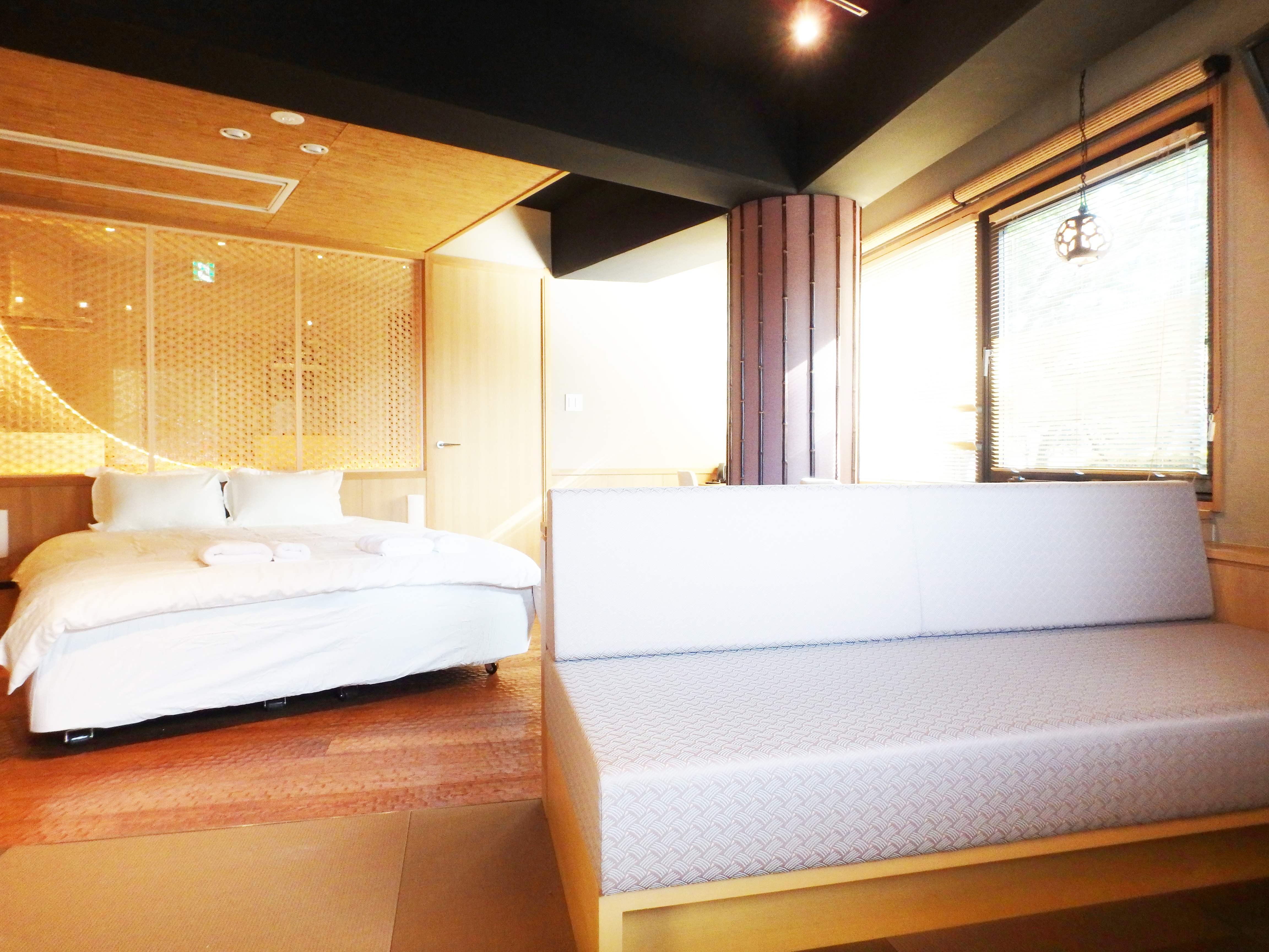 Convertible sofa bed in the living area with tatami floor