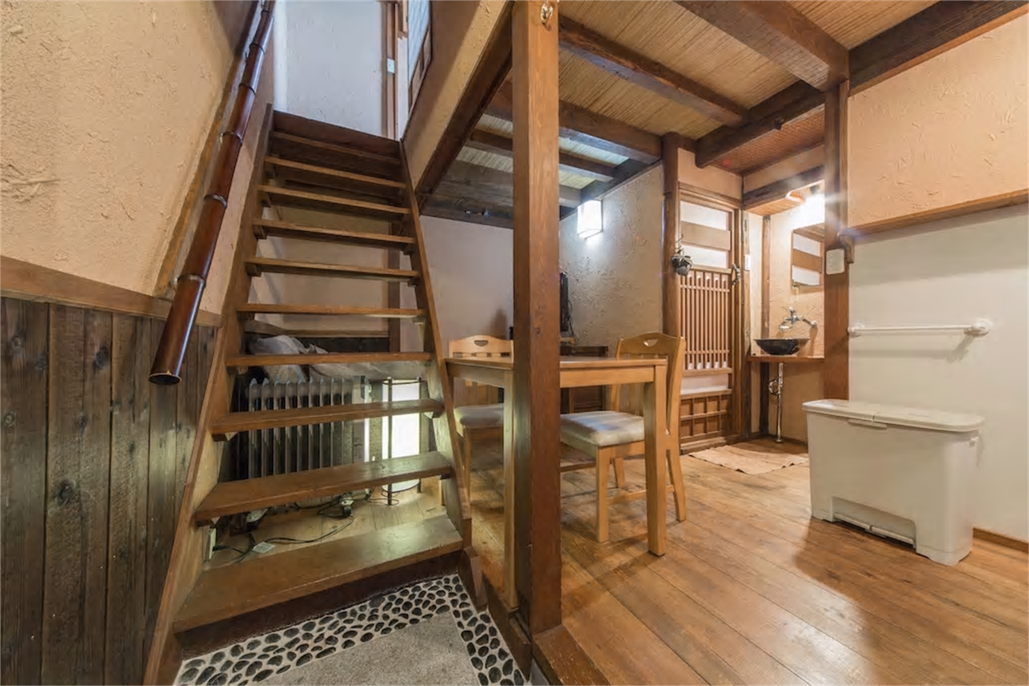 Jizo-An serene ground floor living area with rustic beams