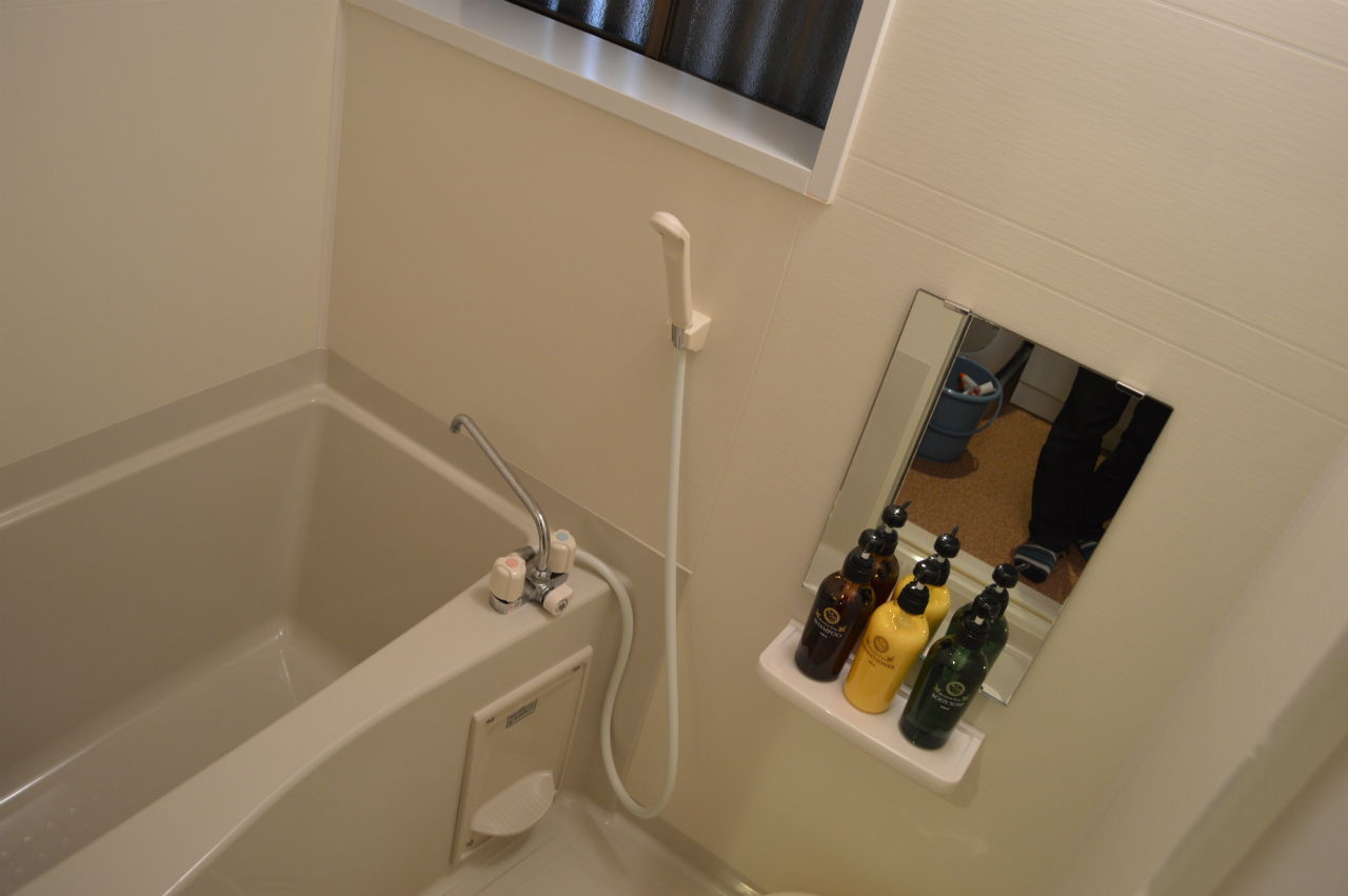 Luxury bathroom with deep soaking tub in Ougi-An